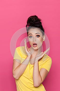 Surprised Beautiful Young Woman Is Holding Head In Hands
