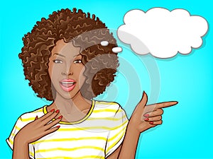 Surprised black woman pointing by finger