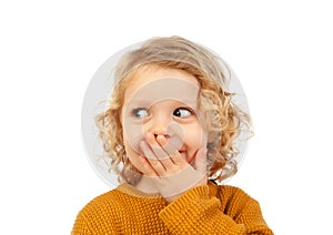 Surprised blond child with blue eyes