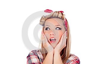 Surprised blonde girl with blue eyes in pinup style