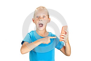 Surprised boy holding smartphone