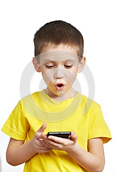 Surprised boy looking at phone