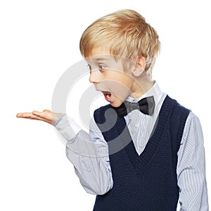 Surprised boy showing something photo