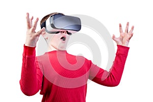 Surprised boy wearing virtual reality glasses