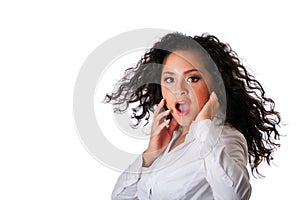 Surprised business Latina woman