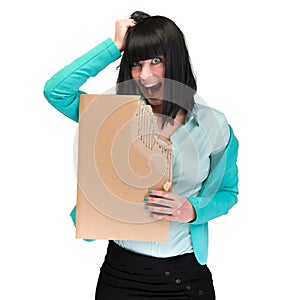 Surprised business woman showing blank cardboard