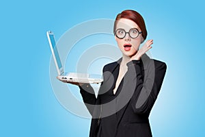 Surprised business women with laptop