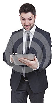 Surprised businessman holding tablet