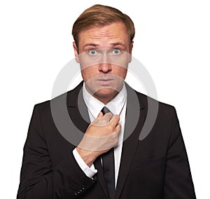 Surprised businessman looking at camera. Isolated