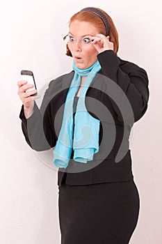 Surprised Businesswoman with smartphone