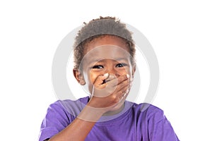 Surprised child covering his mouth