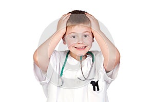 Surprised child with doctor uniform