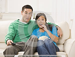 Surprised Couple Watching TV