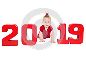 Surprised cute baby girl with red numbers 2019, isolated over white background