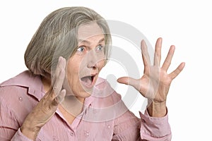 Surprised elderly woman