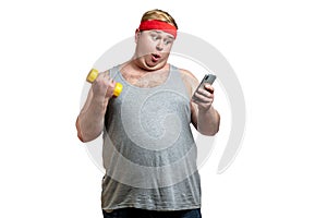 Surprised fat man isolated on white background
