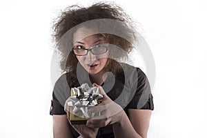 Surprised Frizzy Haired Girl Holding a Gift