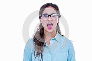 Surprised geeky hipster with her mouth open photo