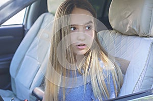 Surprised girl in the car