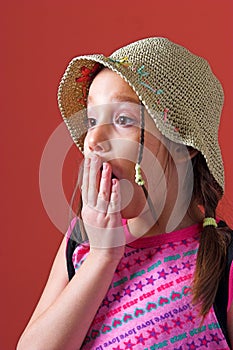 Surprised girl with a hat