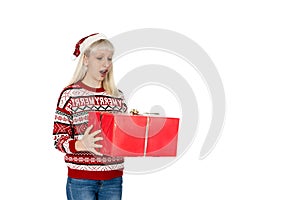 Surprised girl receiving a Christmas present white background.