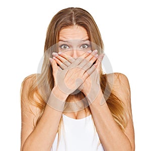 Surprised happy beautiful woman covering her mouth with hand. isolated over white photo