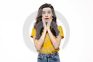 Surprised happy woman looking sideways in excitement, isolated on white background