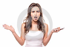 Surprised happy young woman looking sideways in excitement isolated over white background