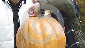 Surprised kids carving jack-o-lantern, Halloween traditions, happy childhood