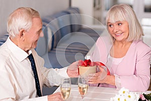 Surprised lady happy about her present