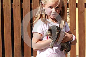 Surprised little girl with a kitty