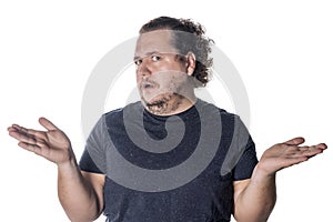 Surprised man throws up his hands in disbelief on white background