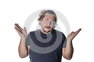 Surprised man throws up his hands in disbelief on white background
