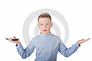 The surprised nice school boy with phone on the white background.arms outstretched