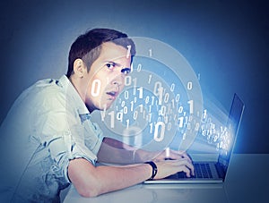 Perplexed man with laptop learning computer science