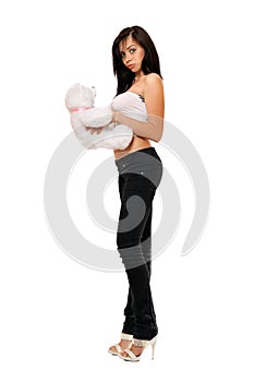 Surprised pretty girl with a teddybear