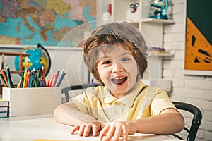 Surprised pupil. Beginning of lessons. Little ready to study. Happy excited school kids at lesson.