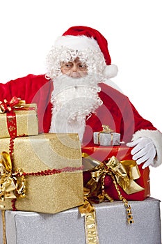 Surprised Santa Claus with Christmas gifts