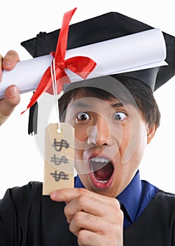 Surprised scholar in expensive education photo