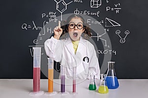 Surprised scientist child having an idea