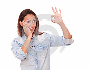 Surprised single lady with ok sign