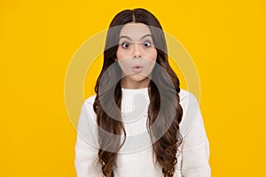 Surprised teenager girl. Teenager child girl with shocked facial expression. Surprised face expression, isolated on