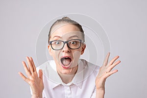 Surprised Woman Expressing Shock photo