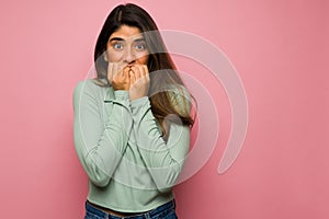 Surprised woman feeling afraid