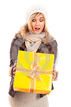 Surprised woman with gift box