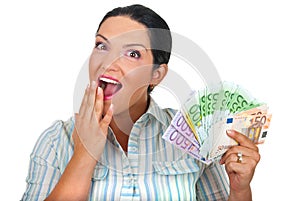 Surprised woman with handful of money