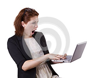 Surprised woman with laptop