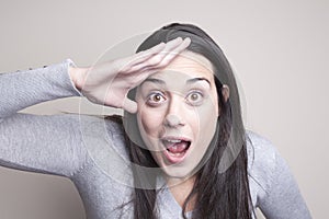 Surprised woman looking to the horizon