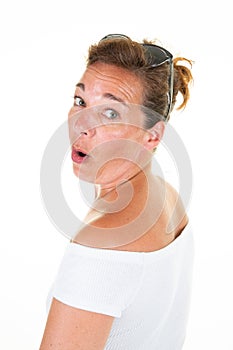 Surprised woman middle aged face portrait in white background