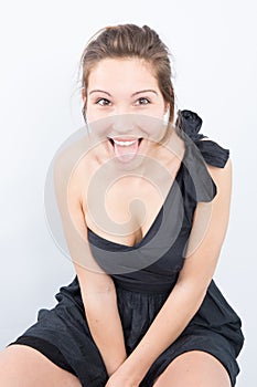 surprised woman with mouth open standing isolated on a white background